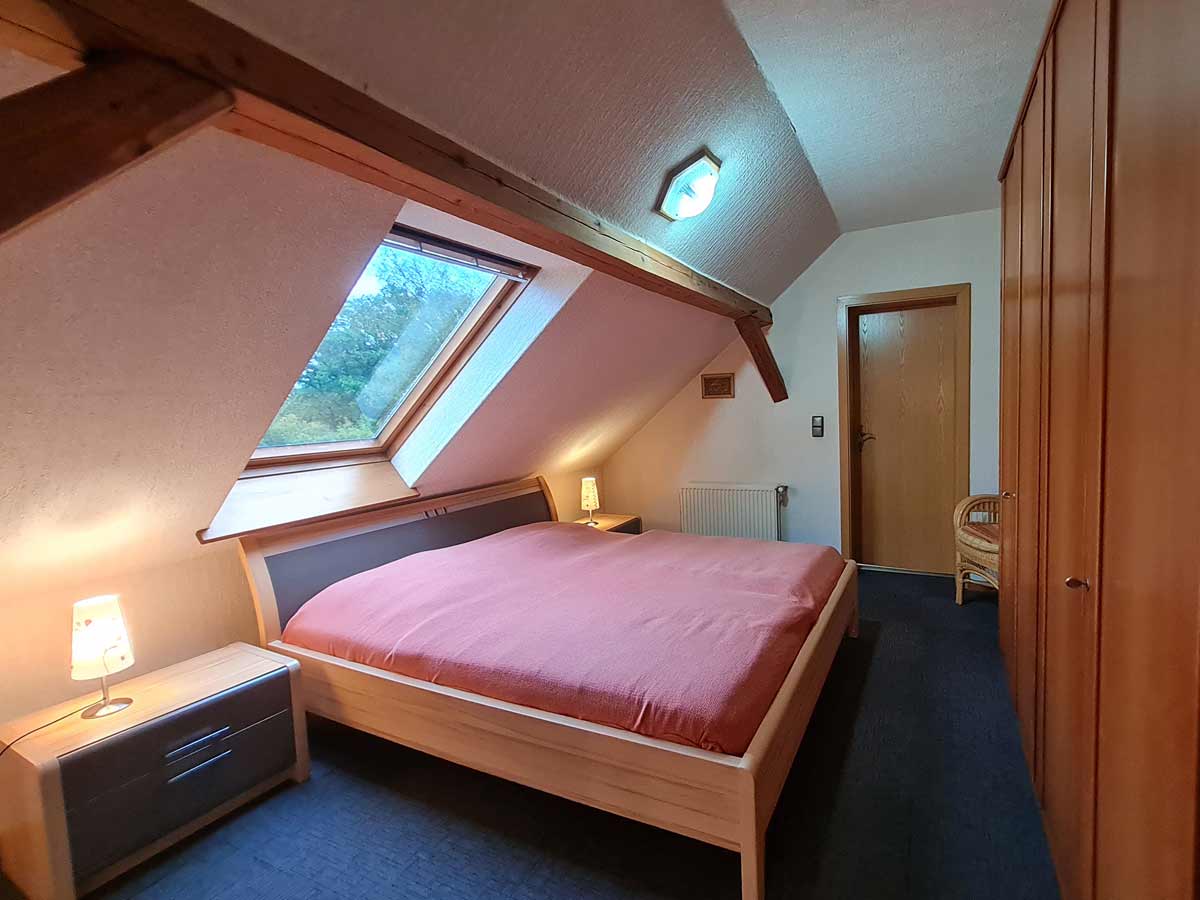 Schlafzimmer Ferienwohnung Eulenflug | Unterbringung | Ferienhof & Reiterhof Lünzen
