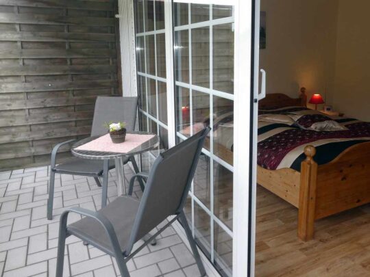 Doppelzimmer mit Balkon und Badezimmer | Unterbringung | Ferienhof & Reiterhof Lünzen